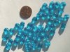 50 8-9mm Dented Twisted Ovals - Aqua